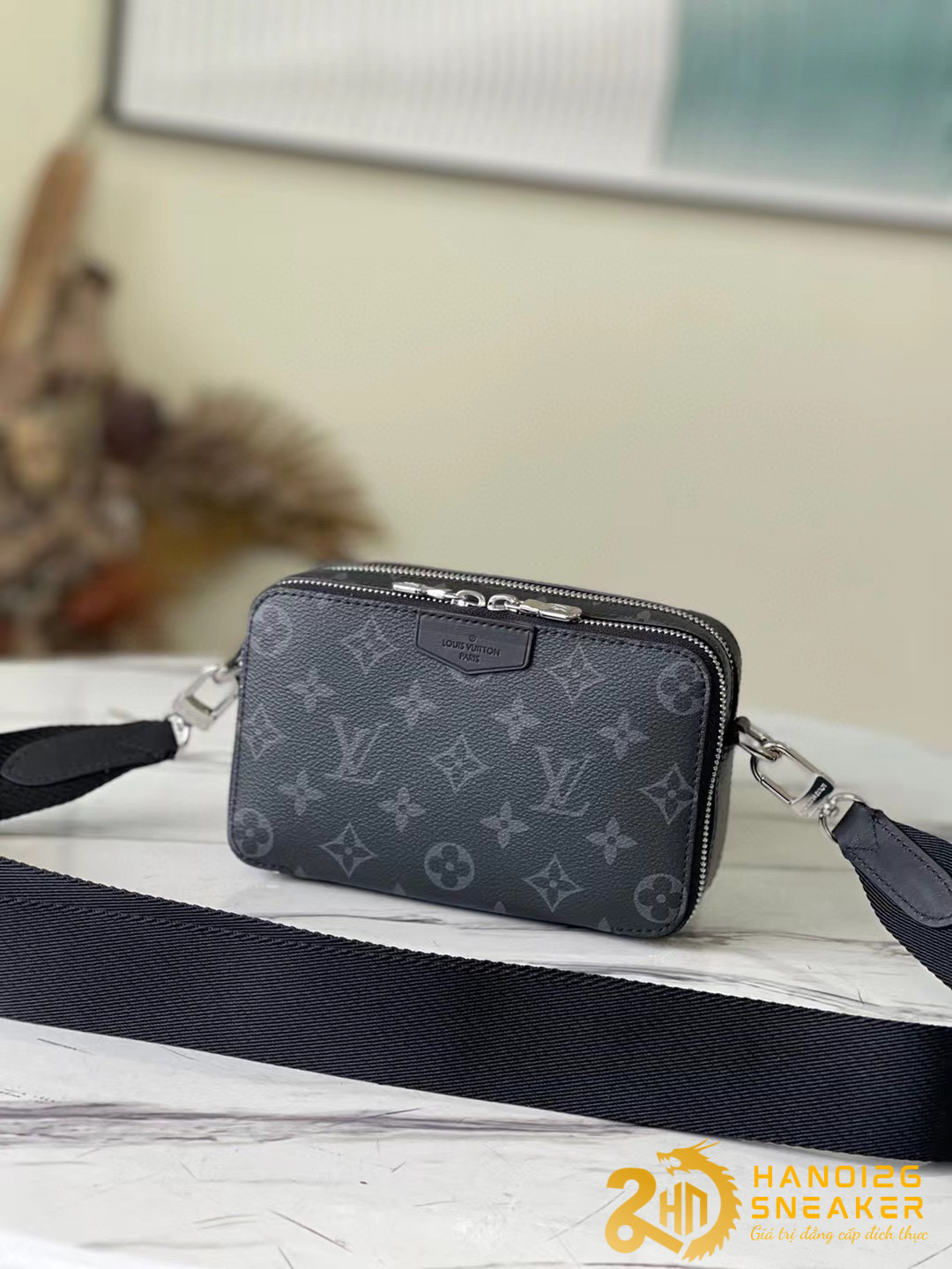Ví cầm tay LV Alpha Wearable Wallet Monogram Eclipse